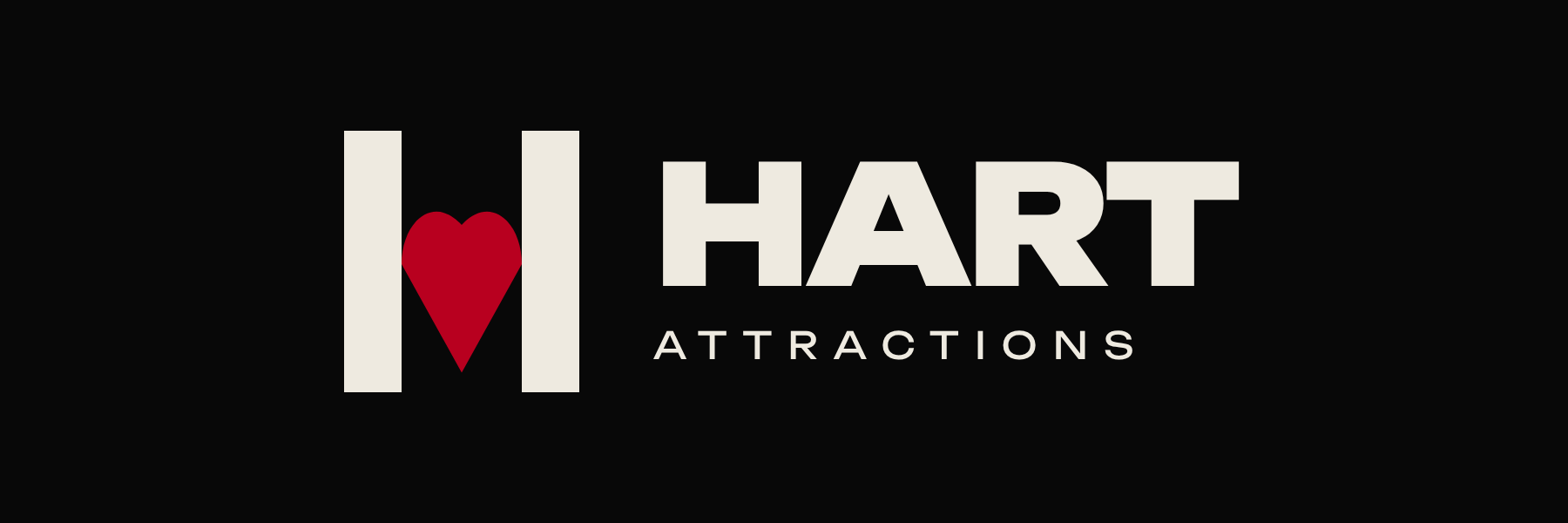 Hart Attractions logo on dark